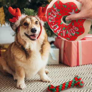 هدية عيد الميلاد الكلب صار مضغ الكعك ألعاب من القطيفة