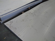 What are the performance characteristics of the Q355NHC steel plate