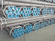 Large diameter straight seam steel pipe rust removal method and production process