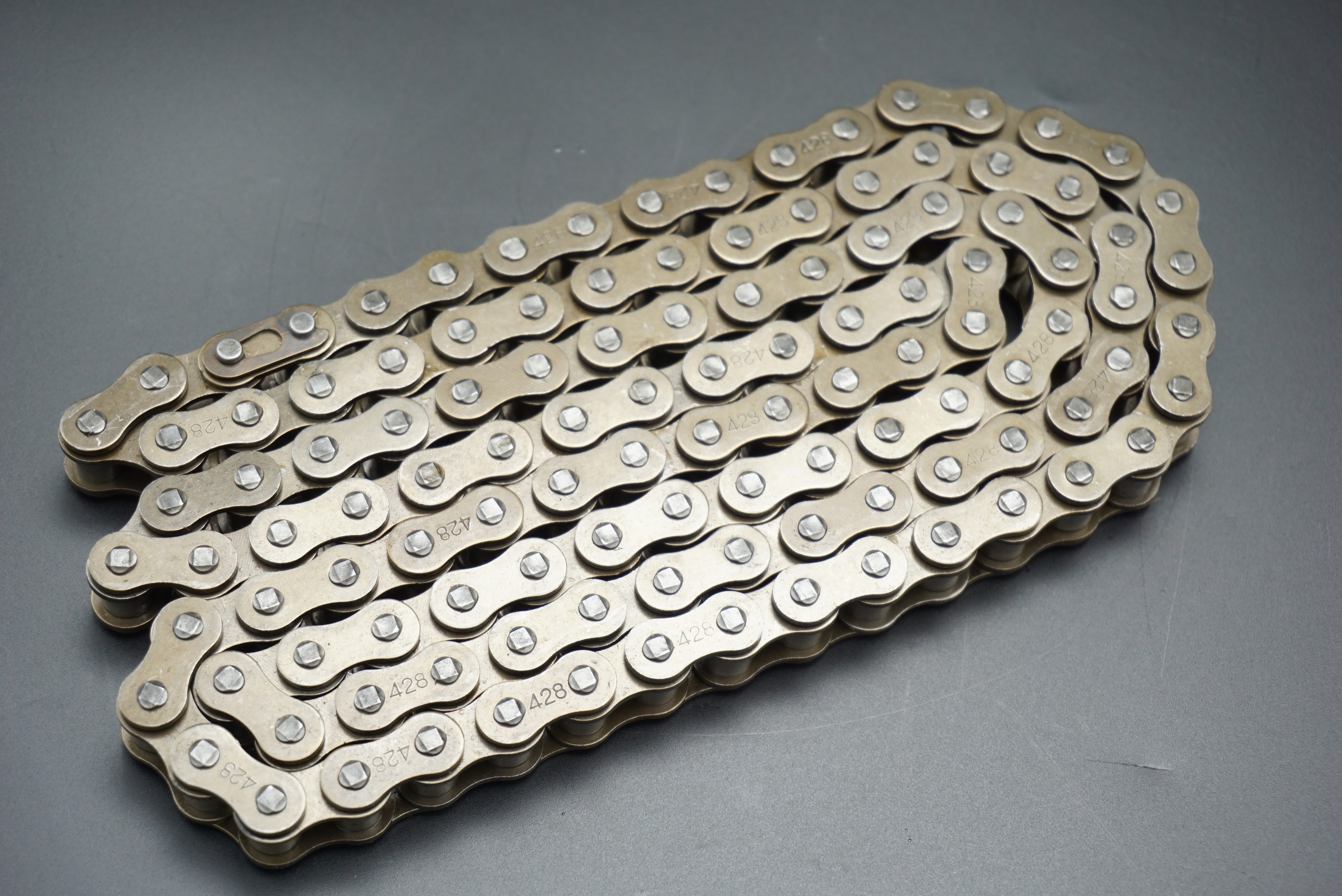 What is the difference between washing or not washing the motorcycle chain?