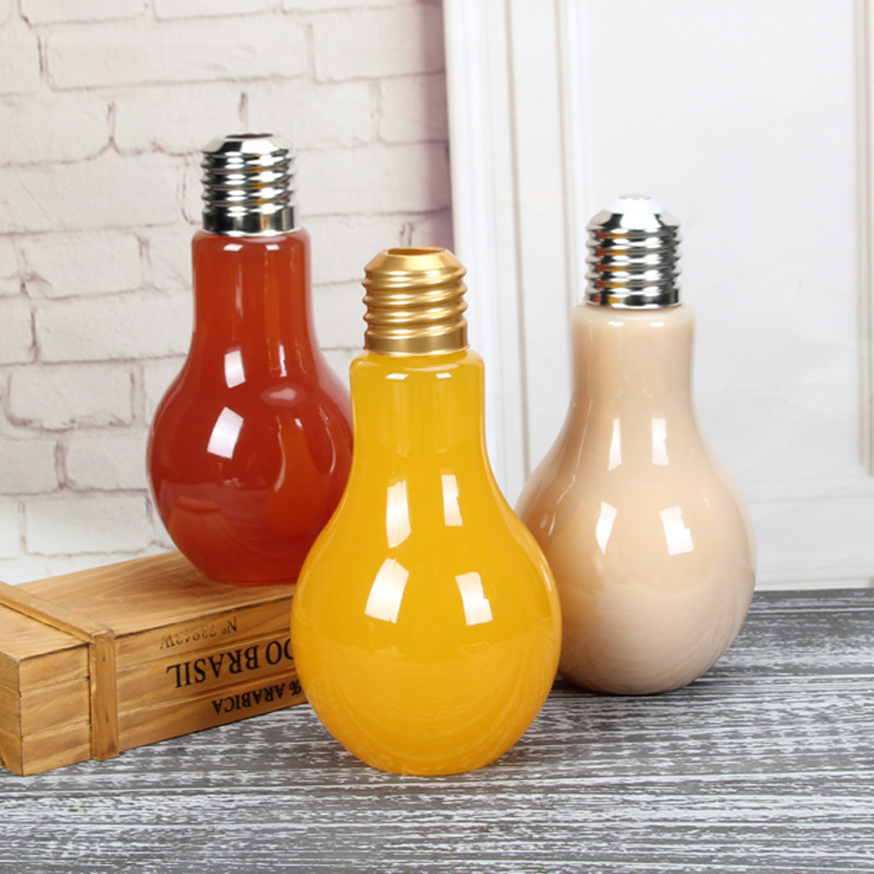 Top Quality Glass Candle Jar With Lid - China Suppliers Golden Screw Cap Wholesale Light Bulb Shape Juice glass Beverage Bottle  – Linlang
