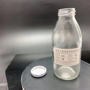 Pabrik 500ml mengosongkan jelas botol jus kaca Minuman Juice Botol Kaca Dengan Cap