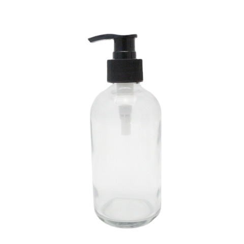 Empty cream glass lotion bottle with press pump cap for shipping