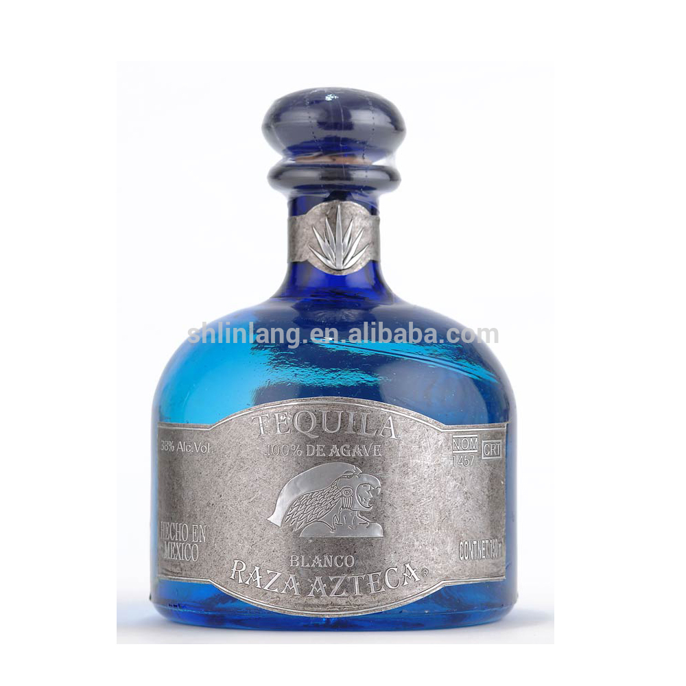 Синяя текила. Текила Blue Agava. Текила алкоголь голубая бутылка. Мескаль в голубой бутылке. Текила в голубой бутылке.