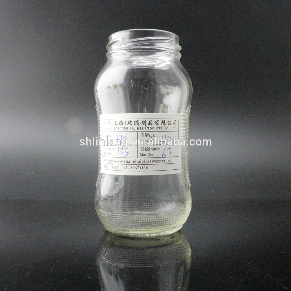 shanghai linlang 100ml 200ml 500ml Unique Shaped Glass Bottle for Honey Empty Glass Bottles for Sale