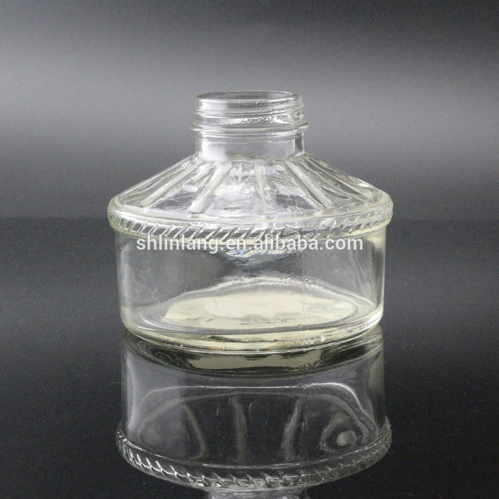 Lámpada de aceite de vidro transparente