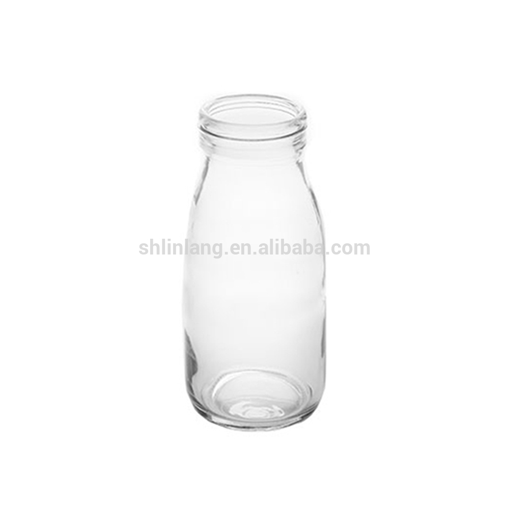 https://cdnus.globalso.com/chglassware/HTB1Kt3bhRHH8KJjy0Fbq6AqlpXapglass-small-milk-bottle-with-plastic-cap.jpg