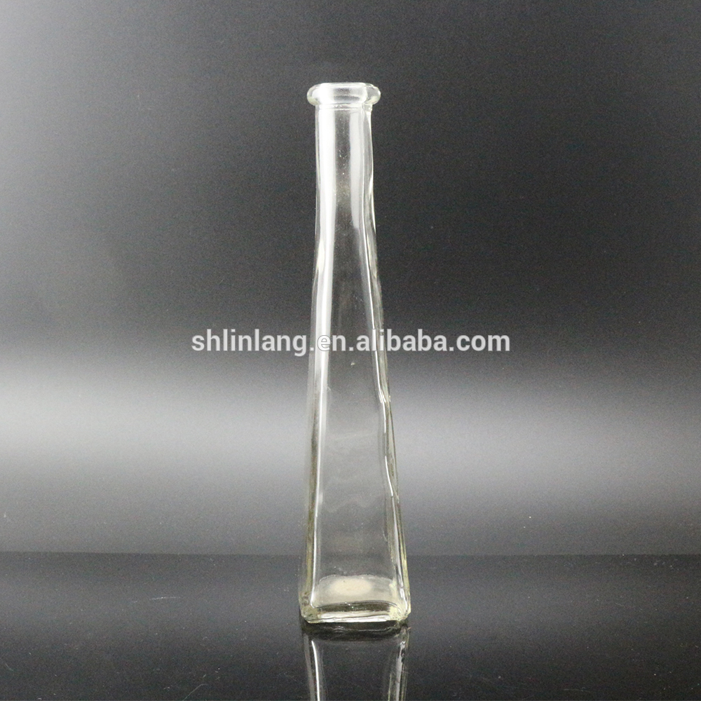 Tall square bottom and round top clear glass vase for decoration