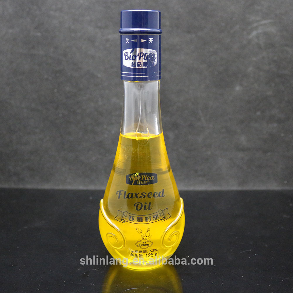 Shanghai linlang High-end Drop Shape Camellia and Olive Oil Glass Bottle