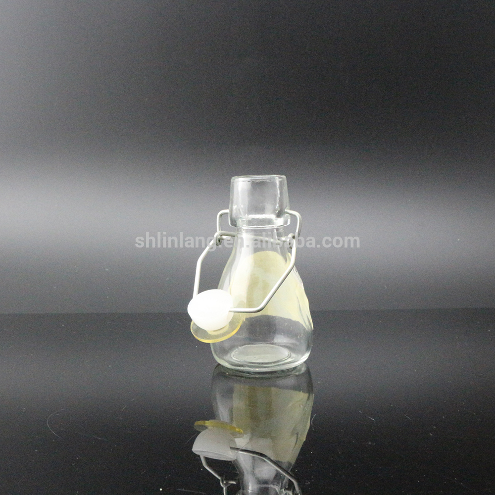 Shanghai Linlang wholesale Eco-friendly 50ml 2oz swing top glass oil bottles