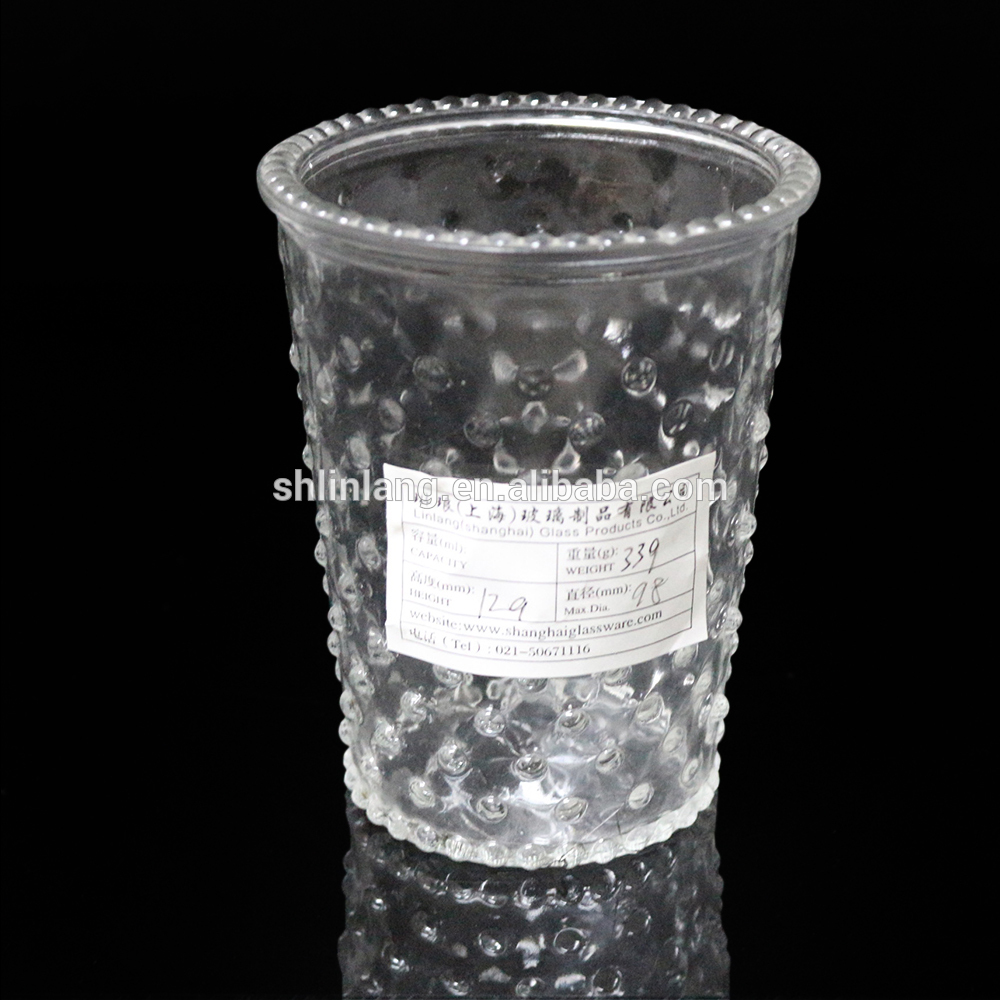 cheap fancy embossed glass candle cup customized candle holders
