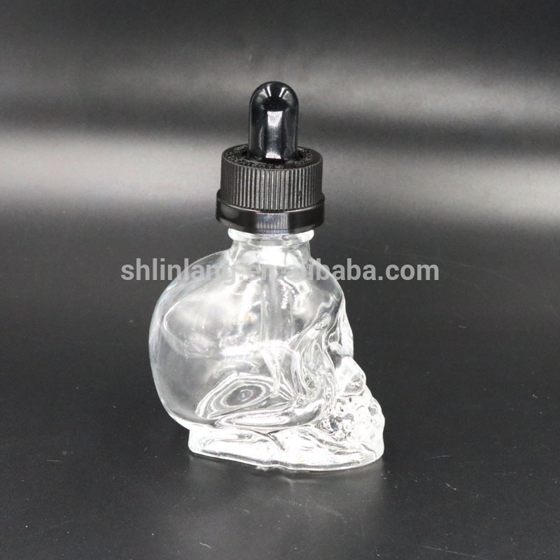 Malaysia import personal care industry cosmetic essential oil use skull shape glass dropper bottle for e-juice