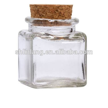 Čína Dodávatelia 24oz 12,5 oz 10 oz 1,4 unce Square Glass Flint Cork Top Jar