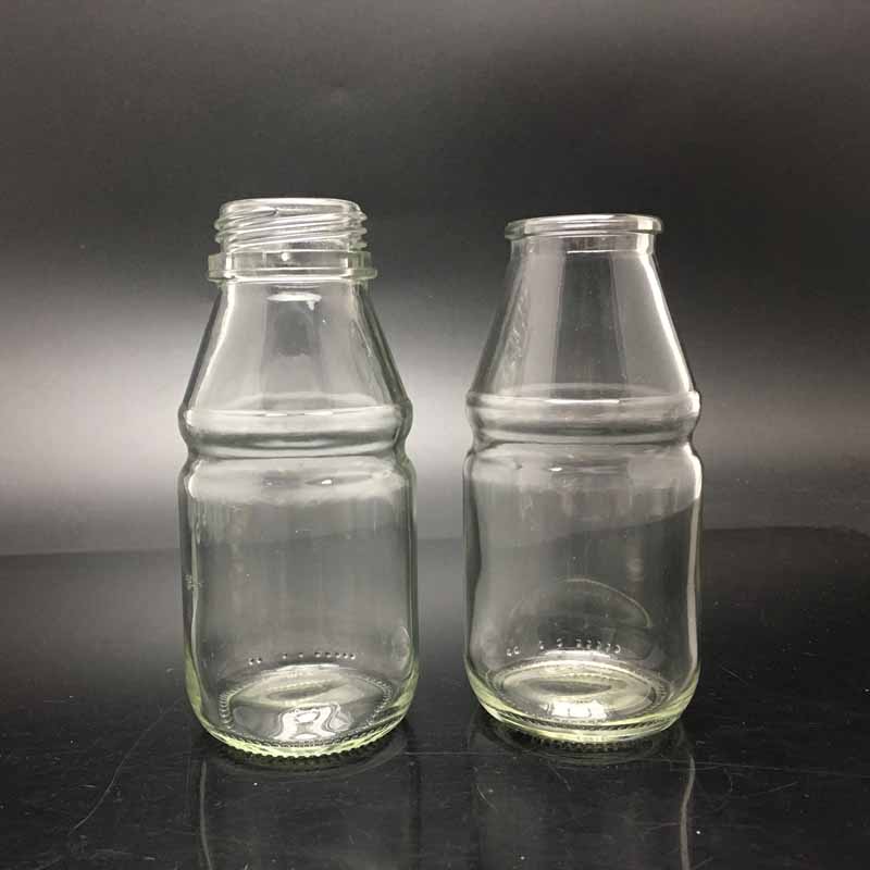 Nouvelle arrivée Boissons à usage industriel et utilisation de jus 200 ml de jus de fruits clairs bouteilles de boisson en verre avec couvercle à vis