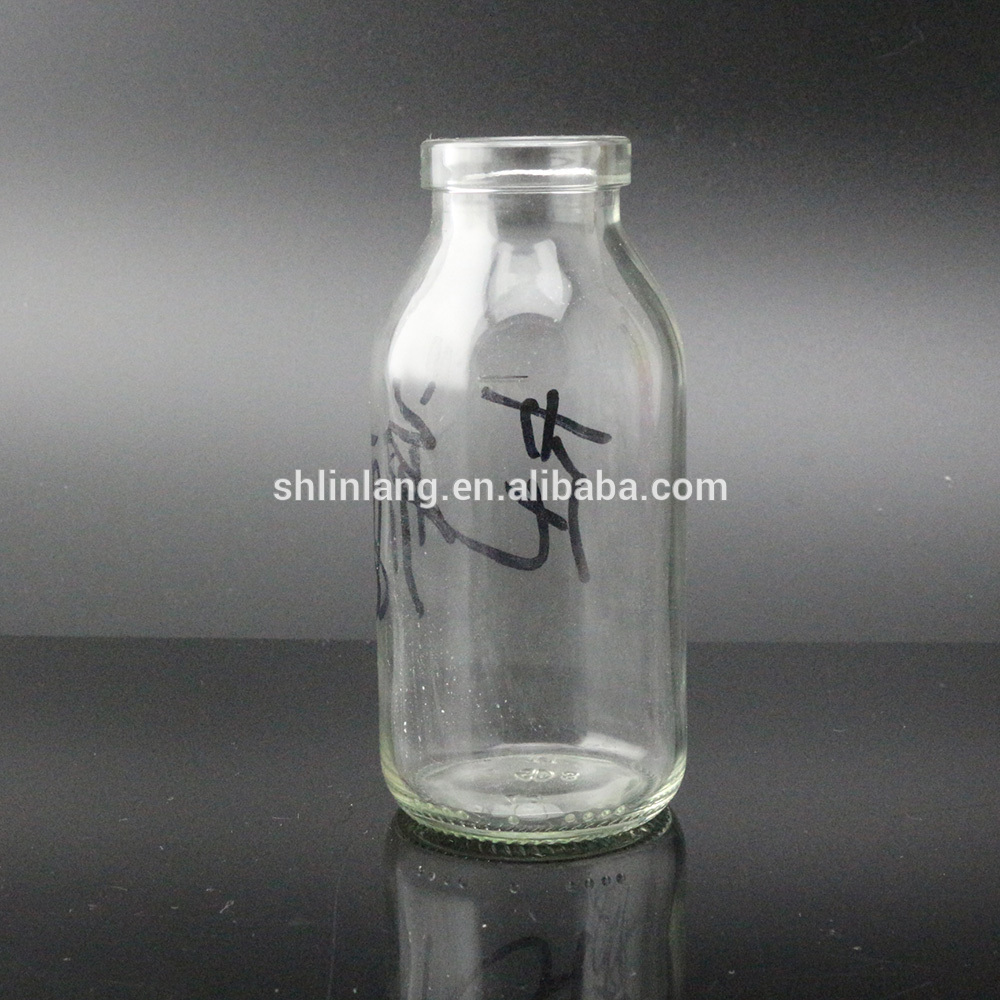 machine made tall clear glass vase