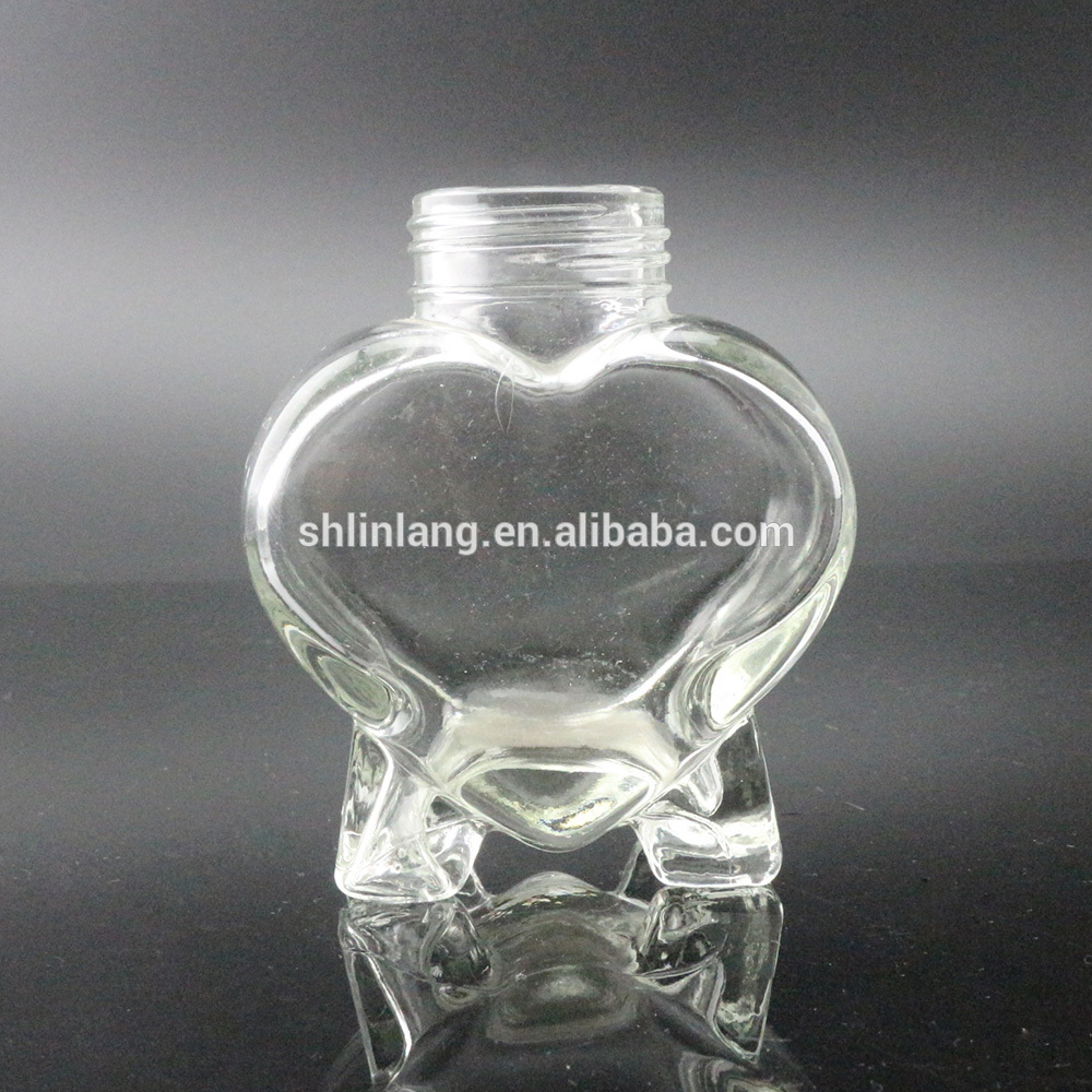 Fixed Competitive Price Oval Hexagonal Glass Honey Jar With Metal Lid - Heart shaped glass oil lamp – Linlang