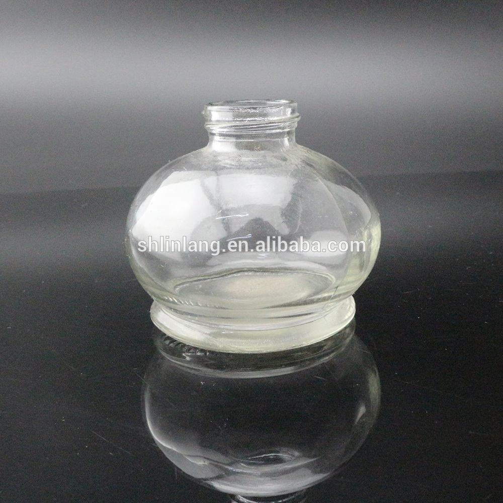 Clear round glass oil lamp