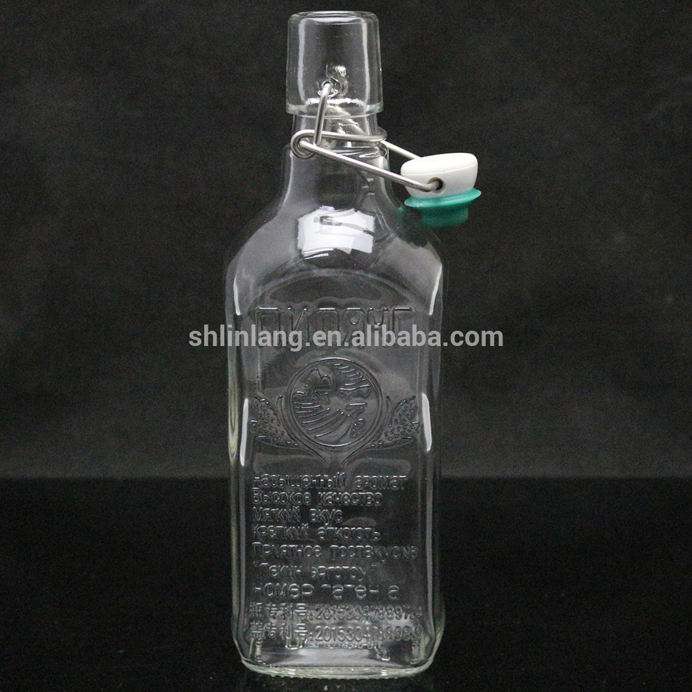 Shanghai linlang Factory wholesale embossed sloe gin bottles with swing stopper