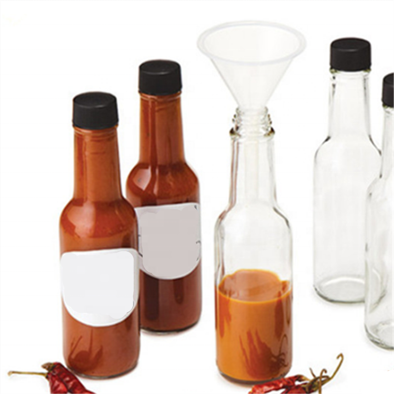 linlang shanghai venta caliente de grado alimenticio de vidrio premium salsa picante botella de embalaje frasco de cadera botella de salsa 150ml