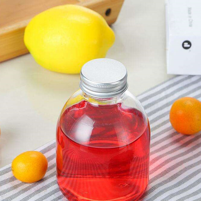 Special Price for Glass Bottles For Olive Oil - Stock 15cc150ml 280ml 350ml 500ml clear milk tea fruits juice glass bottle with aluminum lid – Linlang