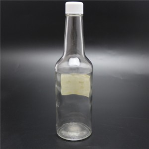 Botella de vidrio woozy de la fábrica de Shangai 10oz con la tapa plástica con el inserto