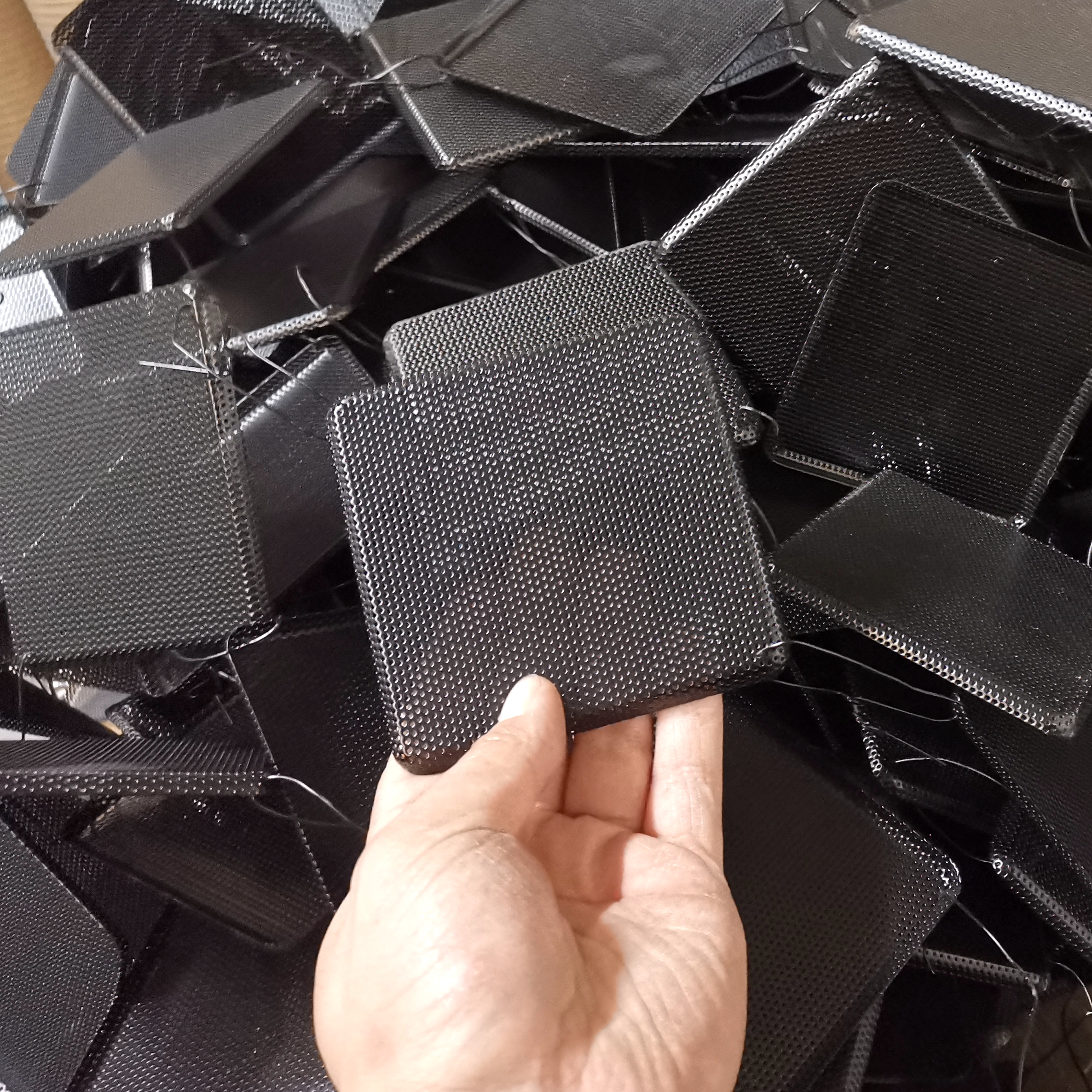 Perforated mesh for speaker grill