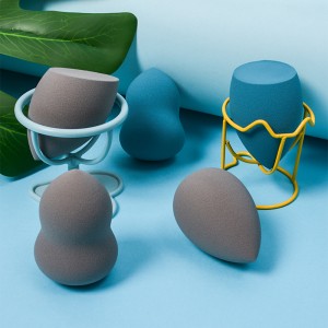 أدوات ماكياج Dongshen متعددة الألوان قطع مائلة على شكل قطرة خالية من مادة البولي يوريثان للوجه وخلاط إسفنجي للماكياج