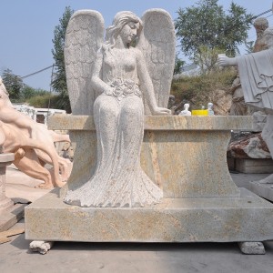 Granite Angel Statuary Sitting And Touching Tombstone