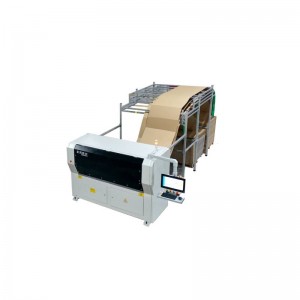 Continuous corrugated paper cutter