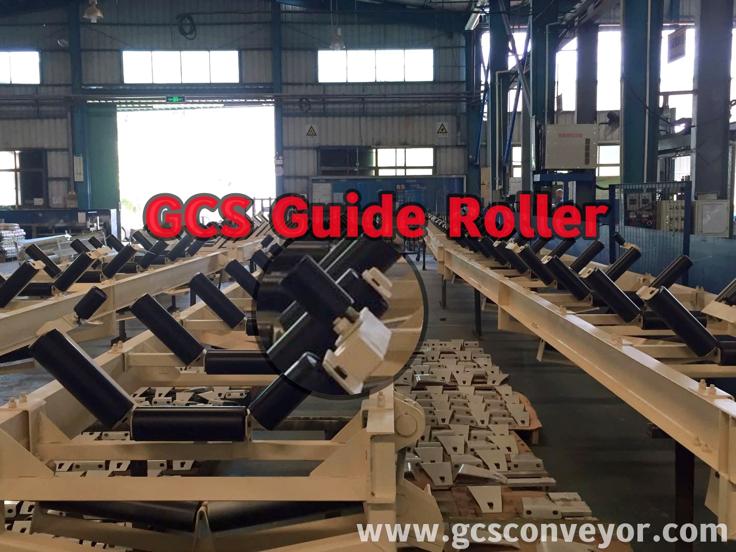 What is a conveyor guide roller?