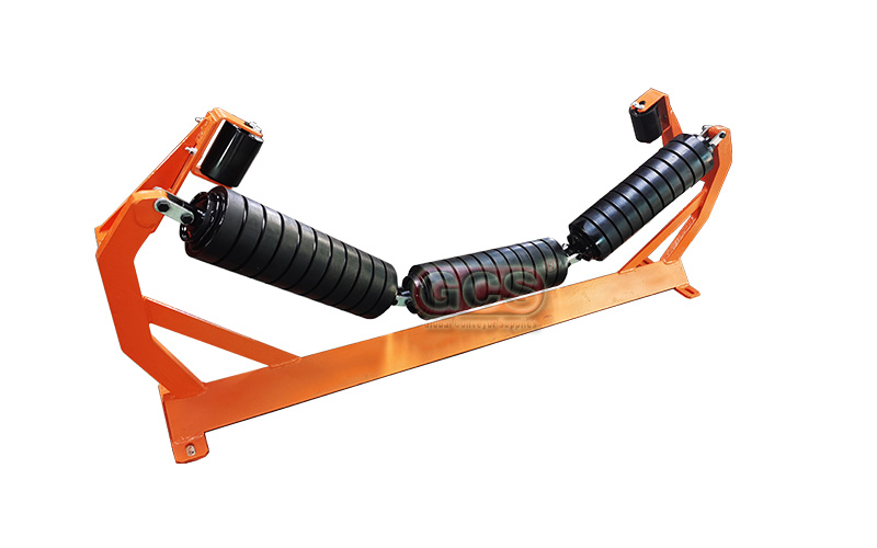 Trough roller with rubber impact roller