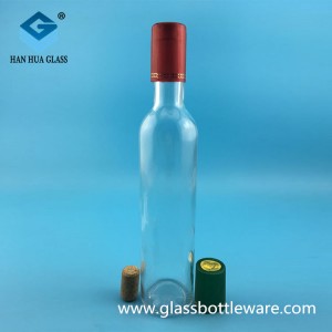 Manufacturer of 500ml transparent glass red wine bottle