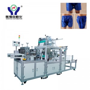 Stroj za izdelavo kirurških hlač za enkratno uporabo