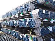 How are industrial seamless steel pipes produced