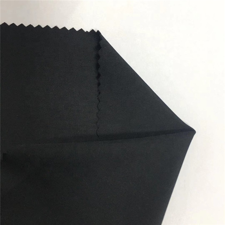 Tissu de legging de yoga à haute élasticité de couleur unie noire 80% polyester 20% Spandex tissu élastique