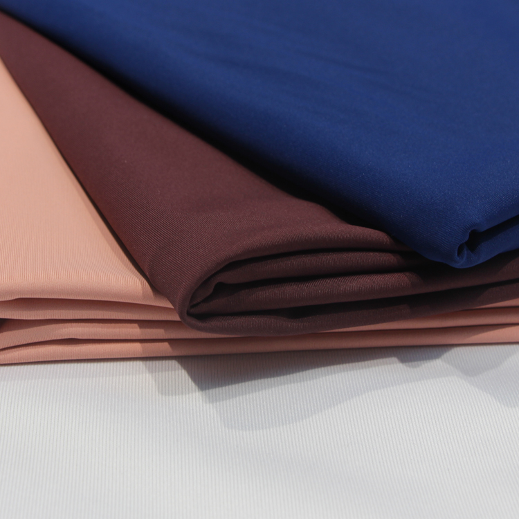 flera färger välj 77% polyester 23% spandex stretch interlock borstat tyg för yoga leggings