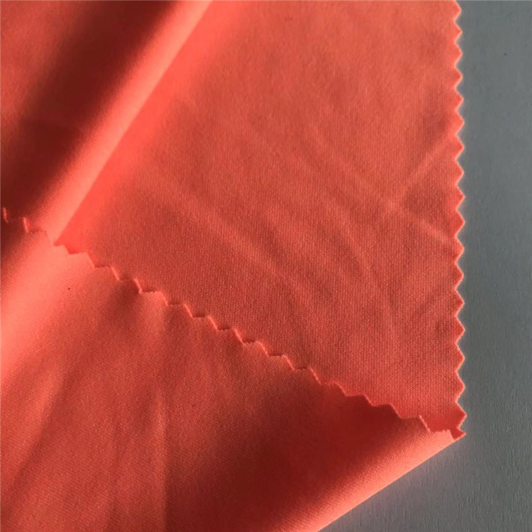 Ekologická pevná oranžová 88% polyester 12% spandex elastická tkanina tréninkové tričko