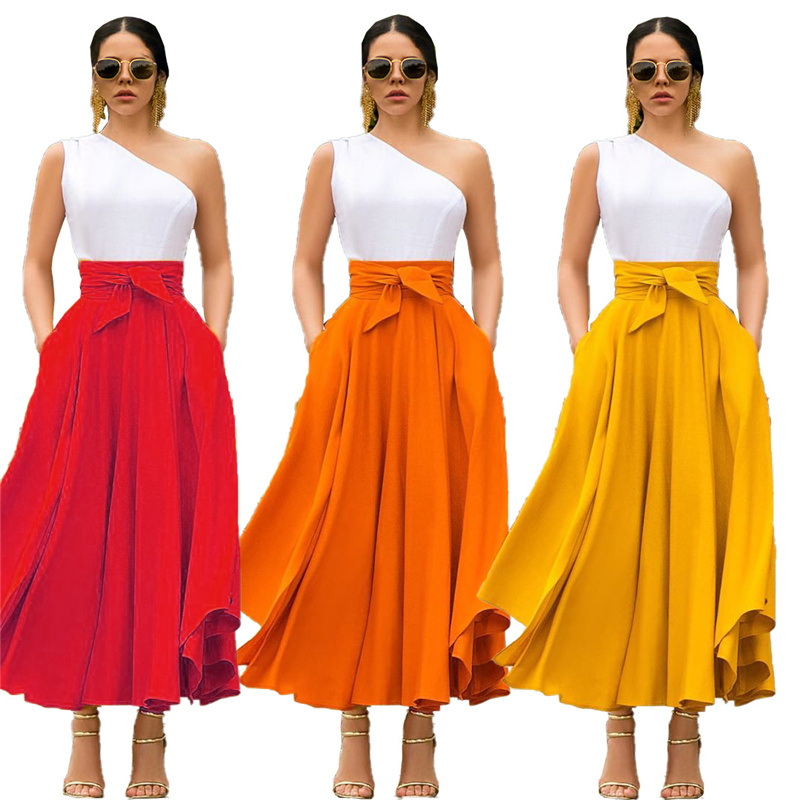 Nueva moda mujeres niñas Europa y América Color sólido cinturón con lazo dobladillo grande Venta caliente vestido falda larga