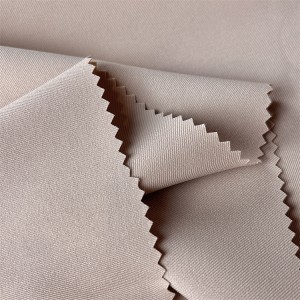 Slitesterk polyester-spandex-blanding for buksestoff for kvinner