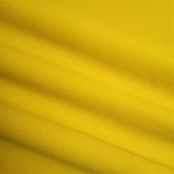 Žlutý strečový polyesterový nylon se spandexovou tkaninou