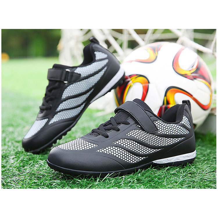 Servei ODM OEM de la Xina de microfibra de cuir impermeable per a la gespa exterior sabates de futbol per a nois i noies