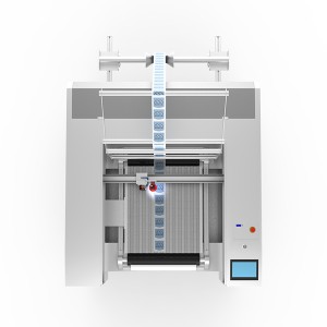 Stroj za lasersko rezanje tkanih nalepk v zvitkih