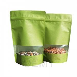 Čista zelena torbica iz zmajevega papirja in prozorno okence za čajne lističe.