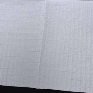 Polyester mesh fabric laid scrims for reinforced medical blood-absorbing paper tissue