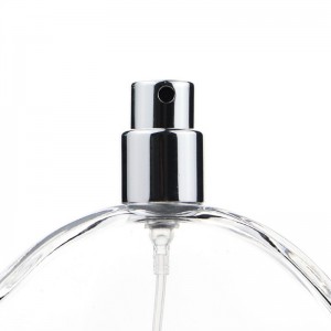 Prázdna plochá okrúhla sklenená fľaša na parfum s pumpičkou