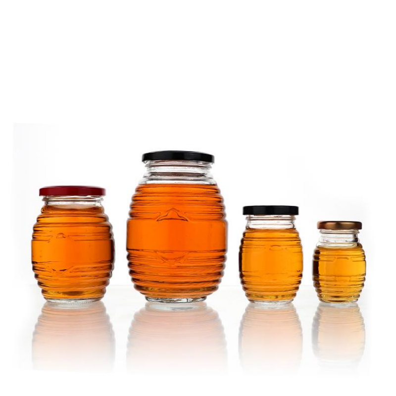 Hete verkopende 100 ml 250 ml 500 ml 1000 ml doorzichtige honingpotten met schroefdraad
