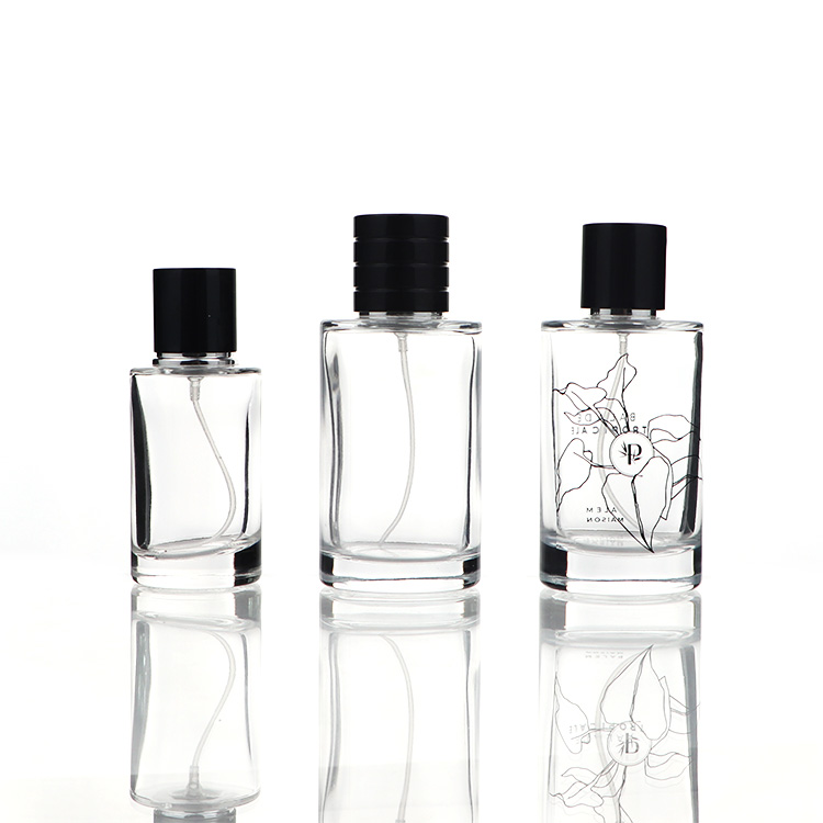 Botella de perfume transparente cilíndrica de 50 ml