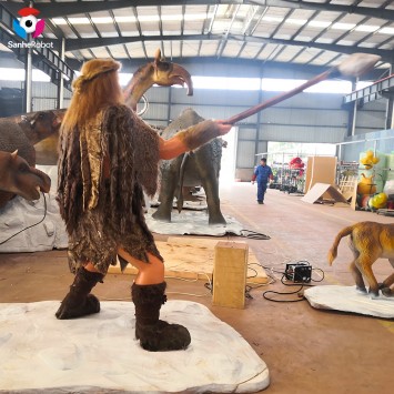 Életnagyságú, valósághű vadászó primitív férfi szobor a vidámparkba