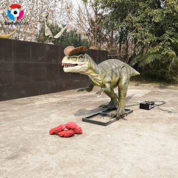 Scene dinosaur-Dilophosaurus eat meat in the theme indoor park