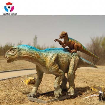 life-sized animatronic dinosaur deinonychus attacks iguanodon model